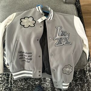 Varsity jacket never worn with tags